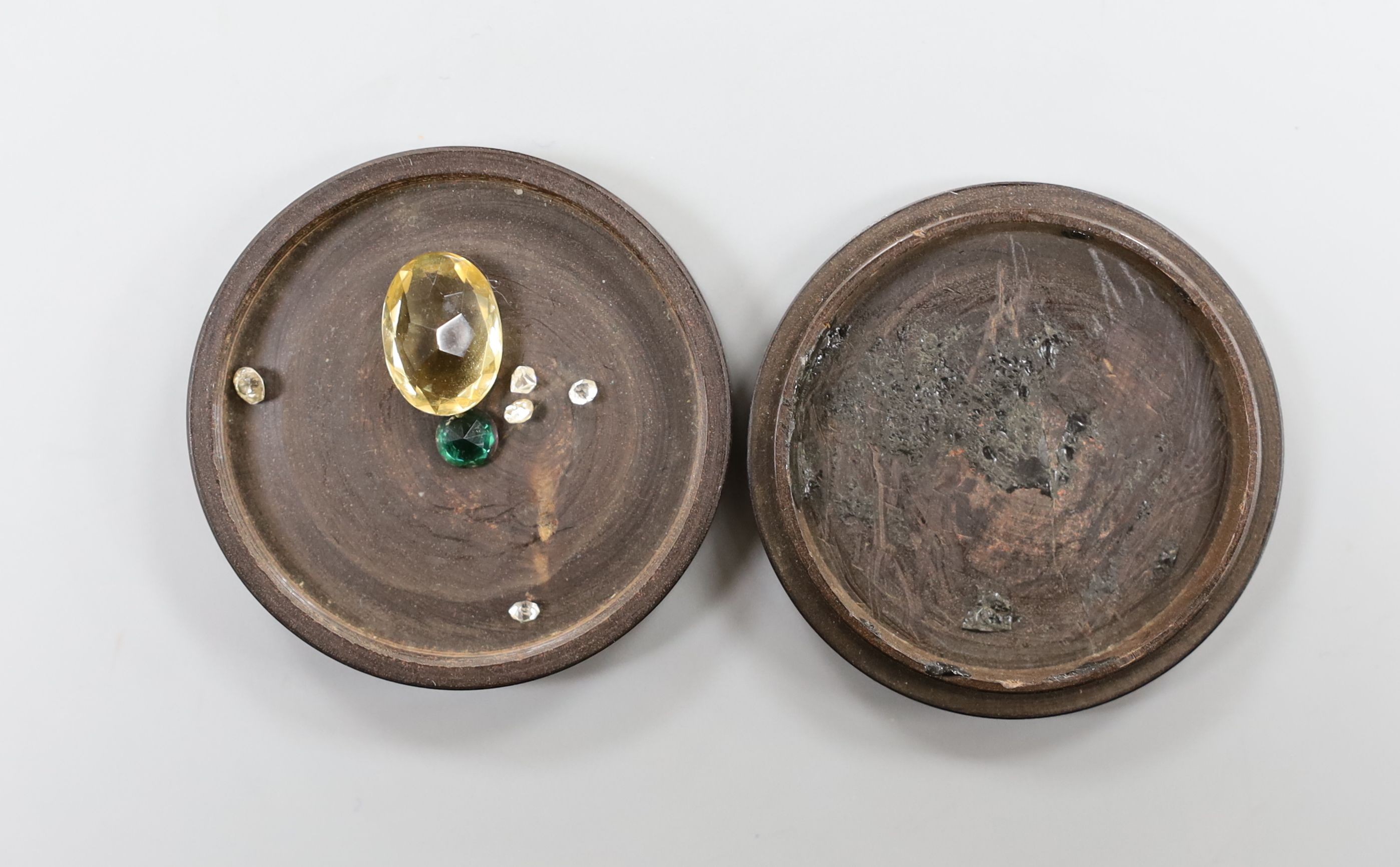 Three small unmounted cut diamonds, total weight approx. 0.33ct and four other cut stones including citrine.